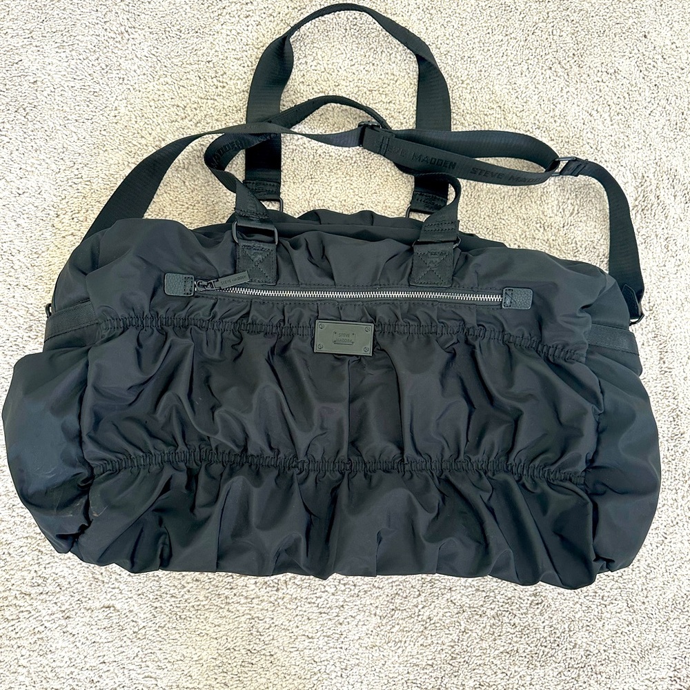 Steve Madden Black Ruffle Over Night Bag